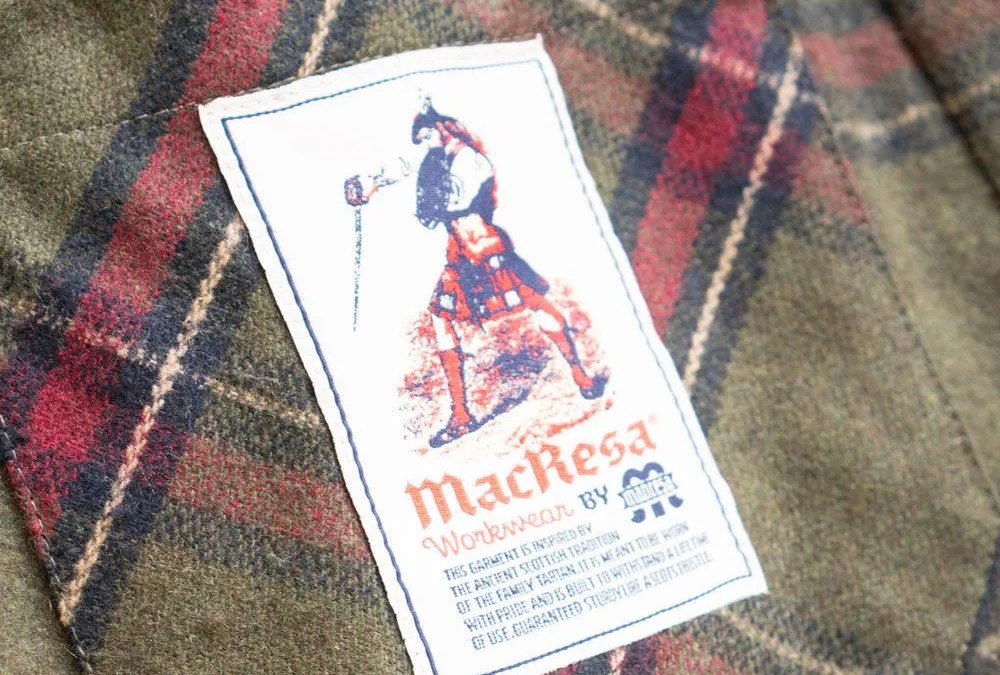manresa tag on plaid jacket