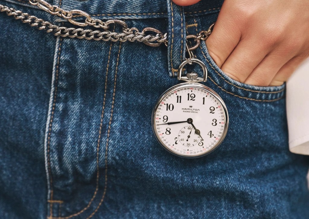 pocket watch and jeans
