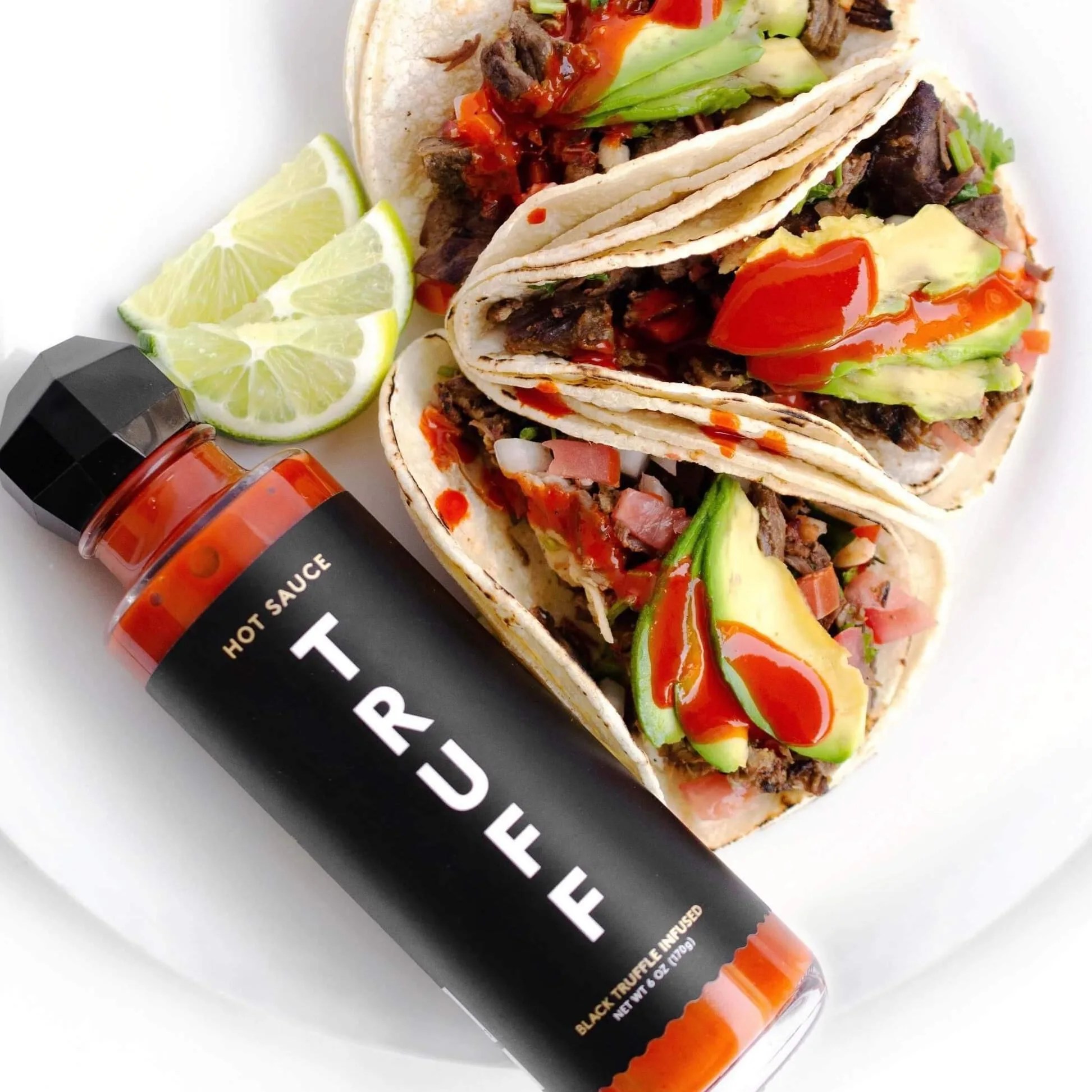 hot sauce next to tacos