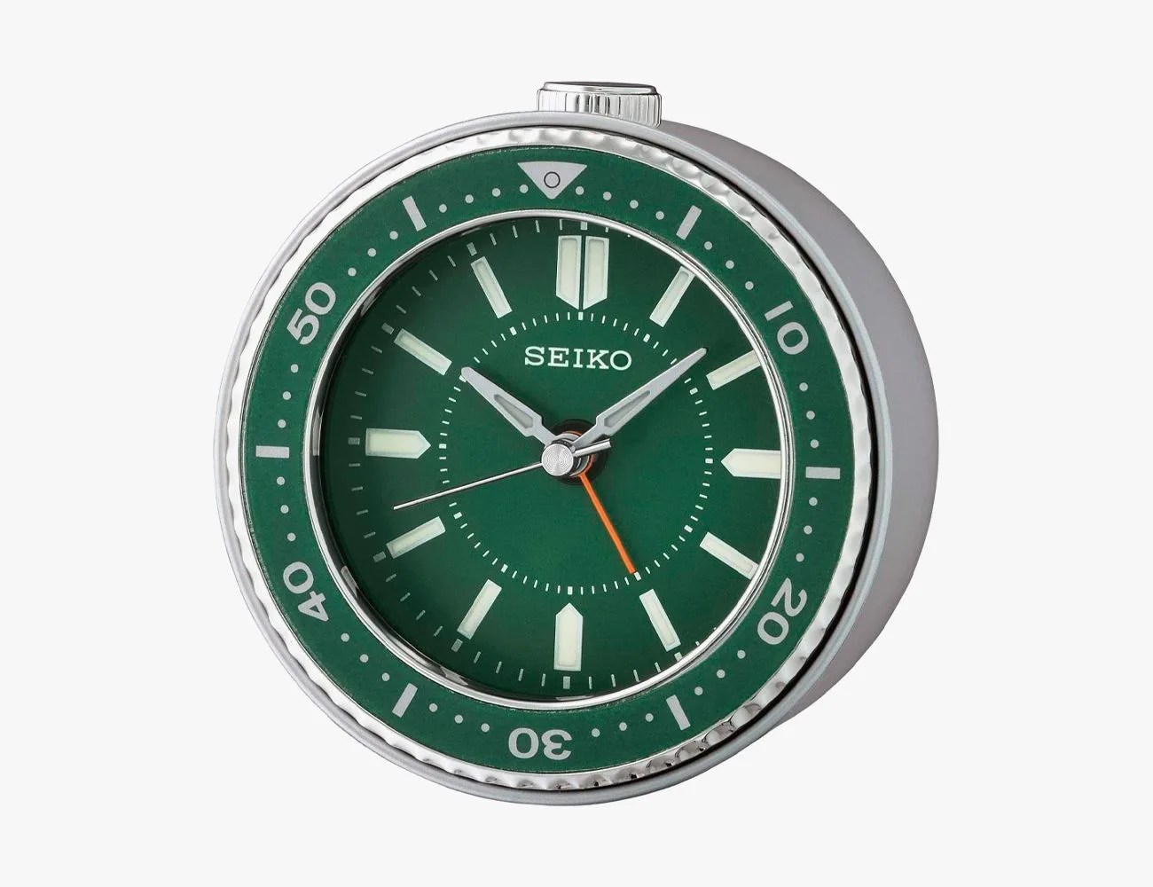 green seiko clock on white background