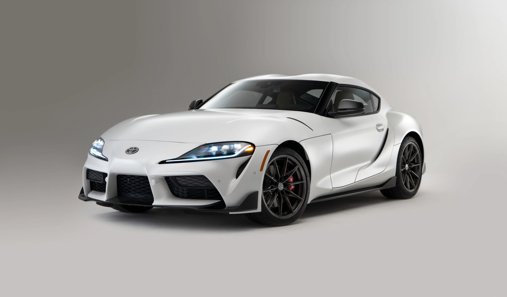 toyota supra on grey background
