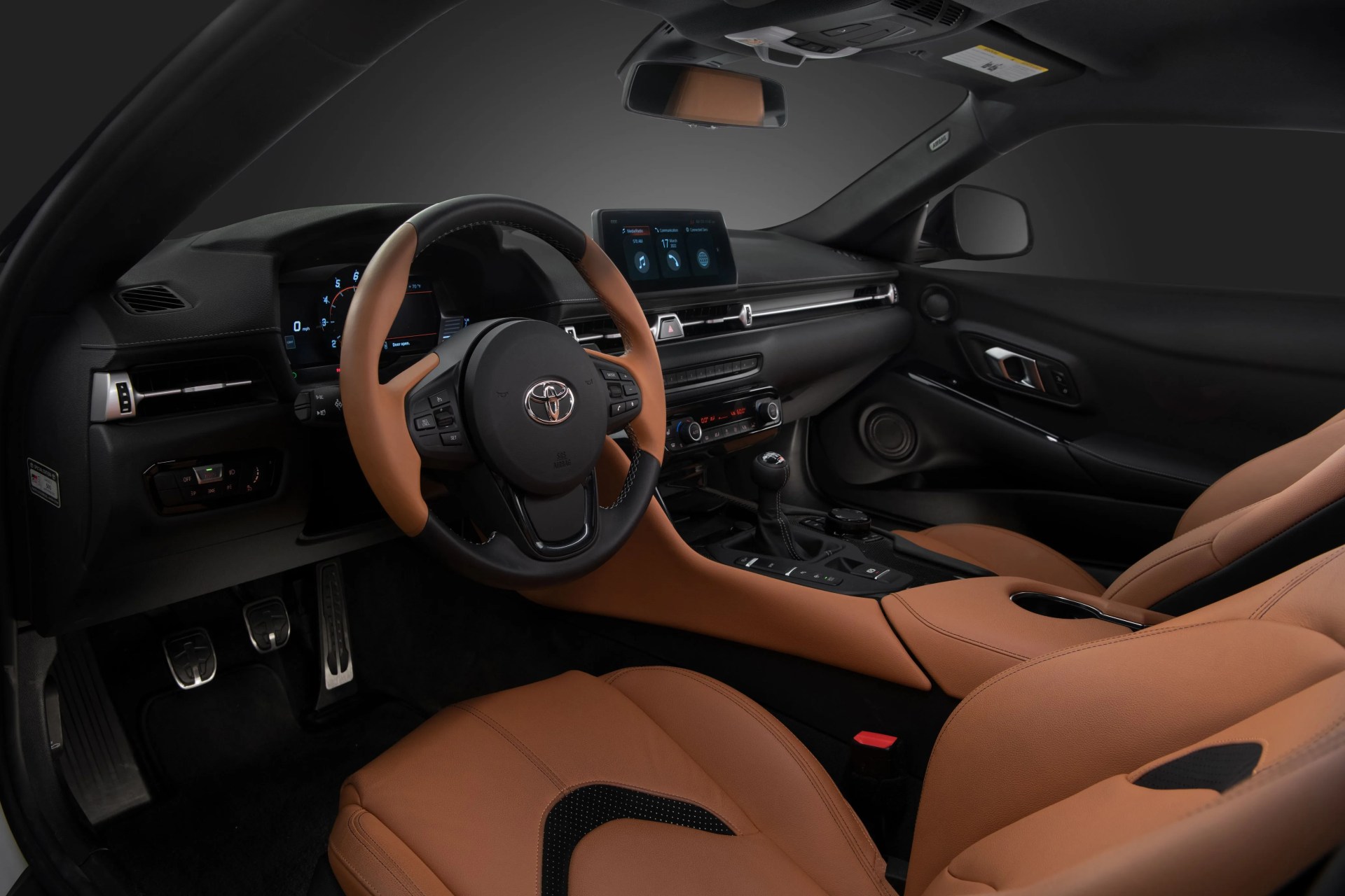 toyota supra interior shot from driver side door