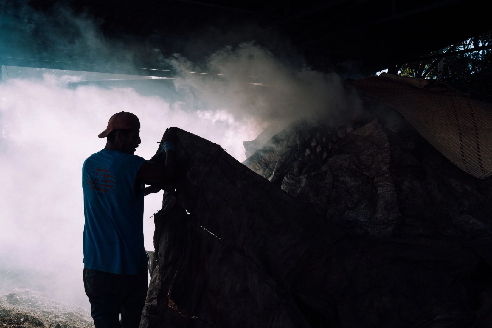 man working on mezcal