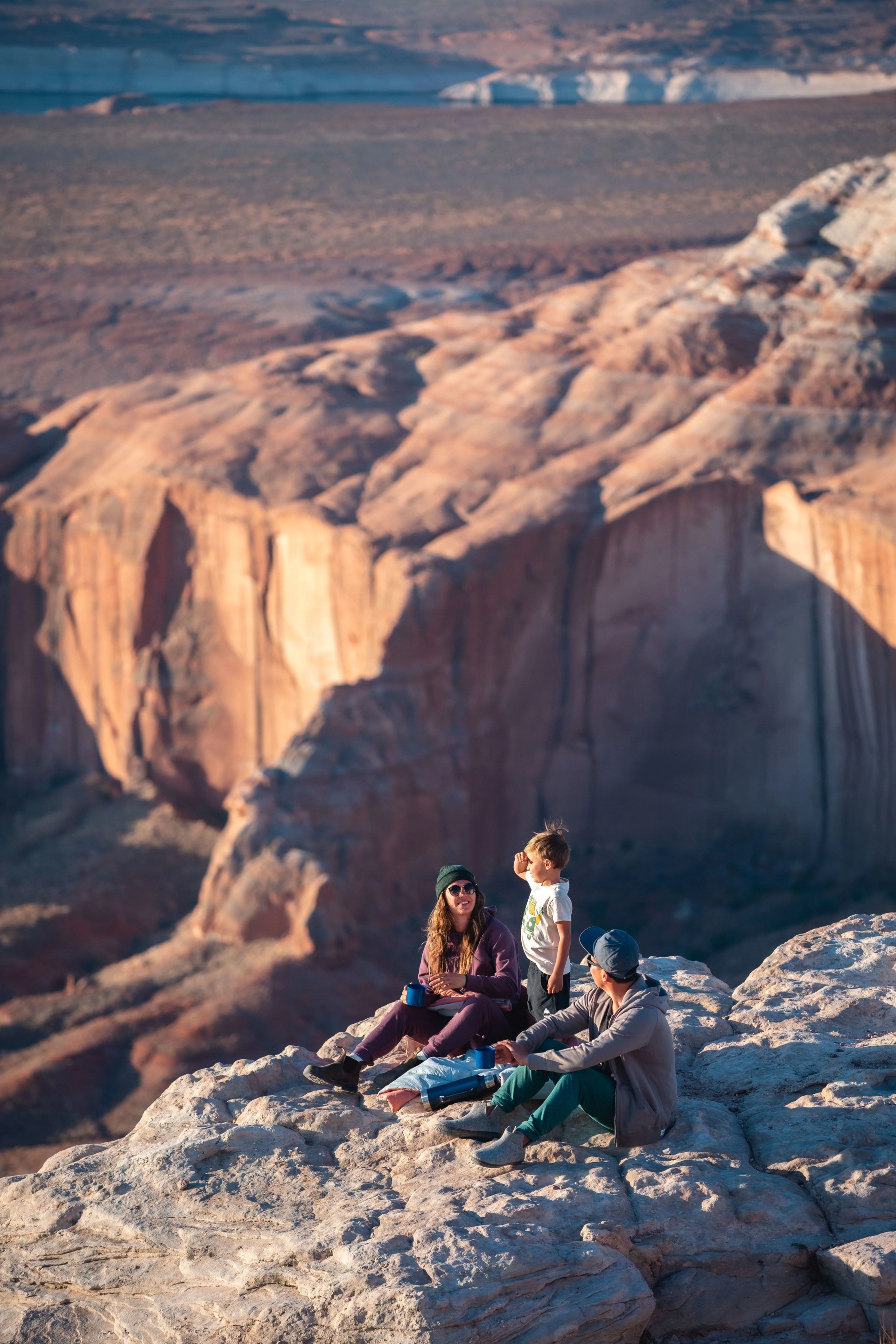 family out on a hike by the canyon