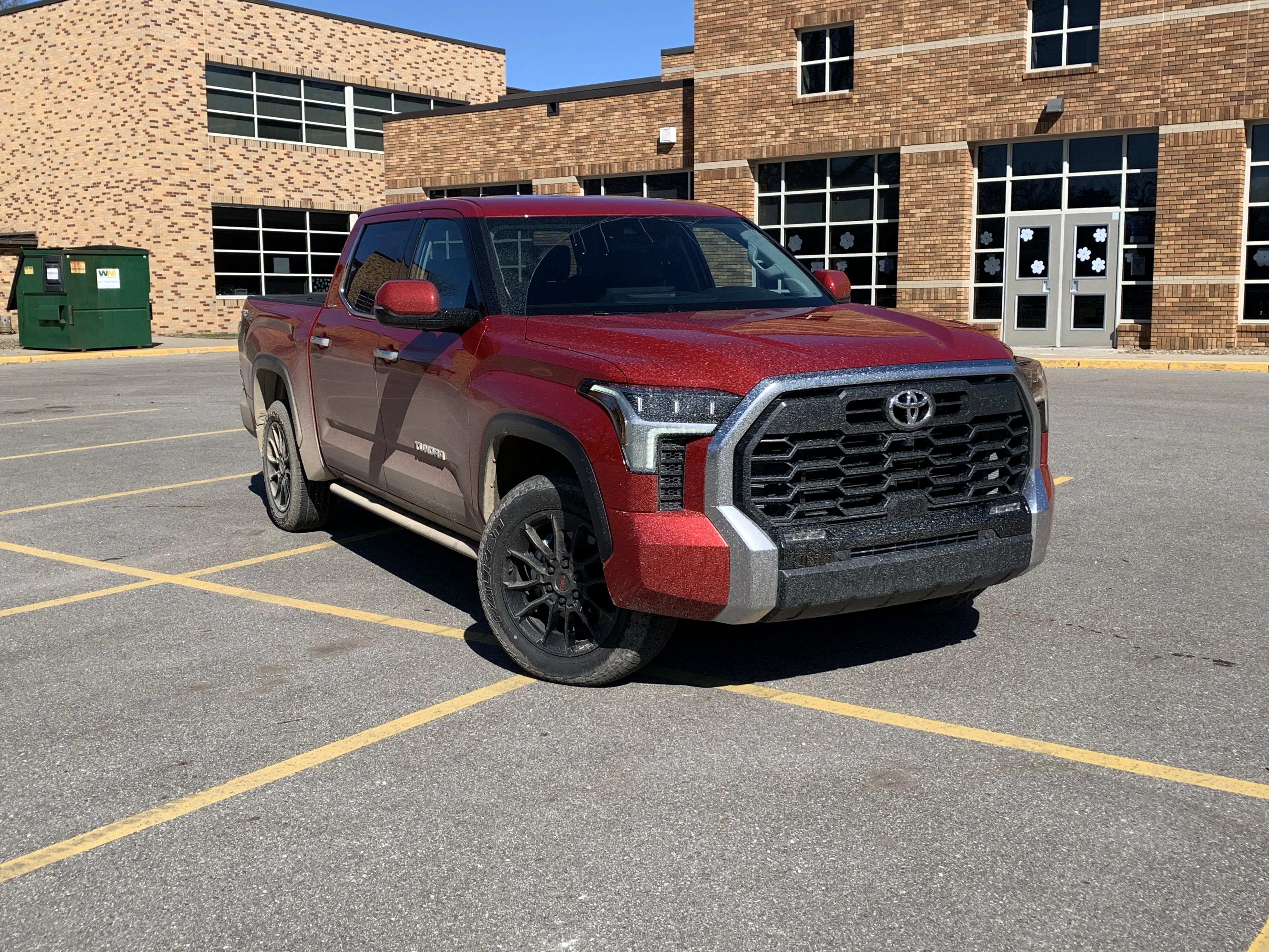 toyota tundra limited in a school parking lot