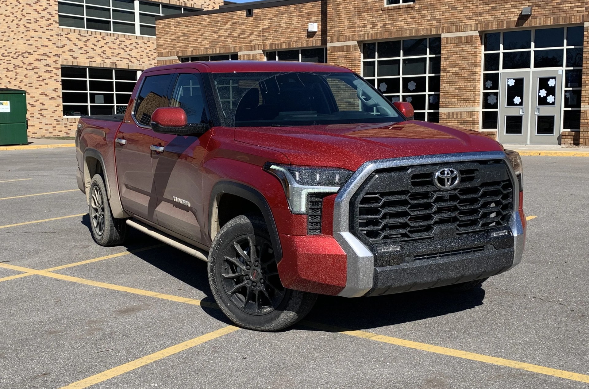 toyota tundra limited in a school parking lot