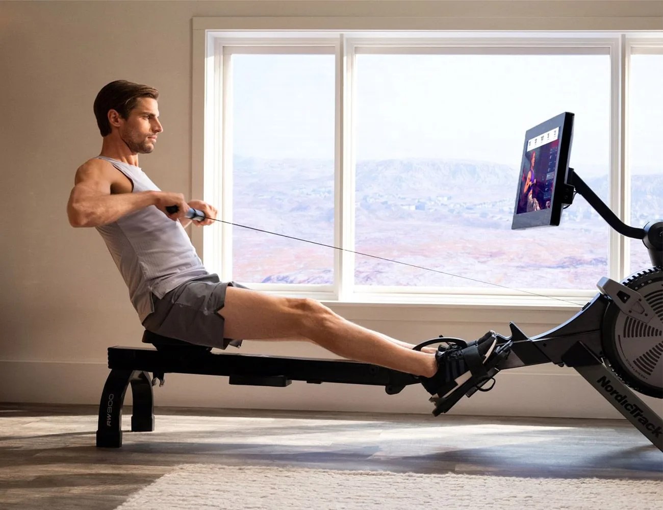 man using nordictrack
