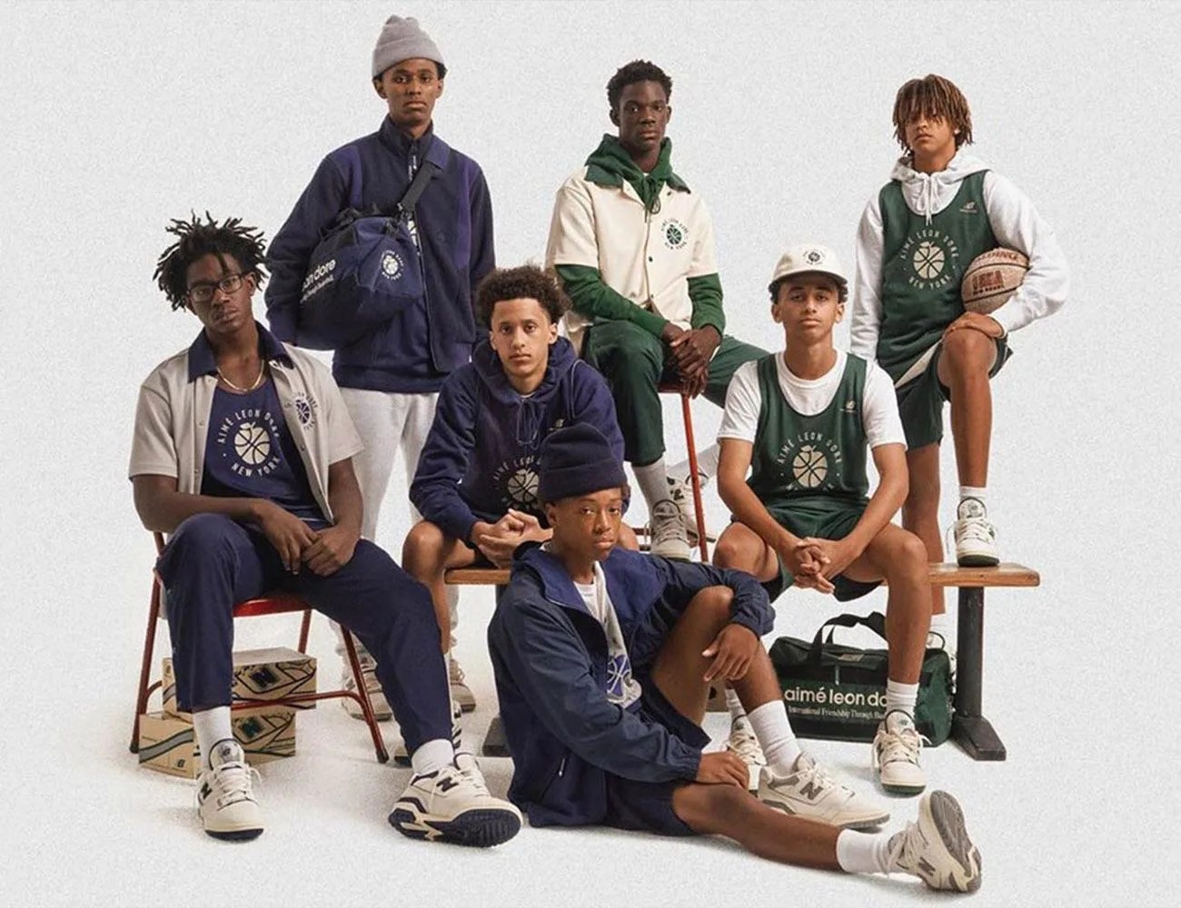 group of men wearing new balance 550 sneakers