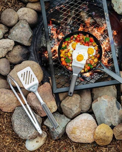 oxo outdoor collection skillet with breakfast roasting over open fire