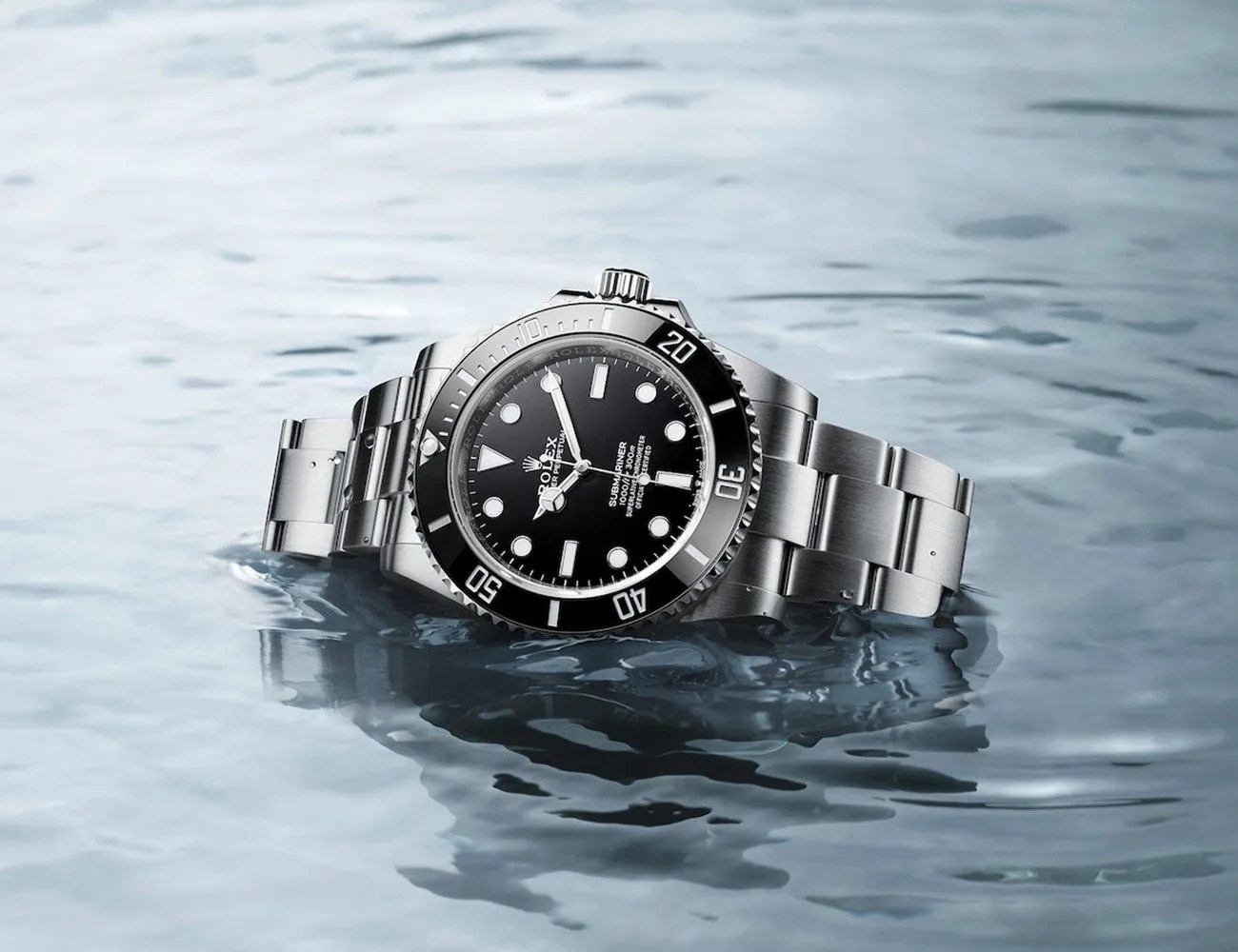 rolex submariner laying in water