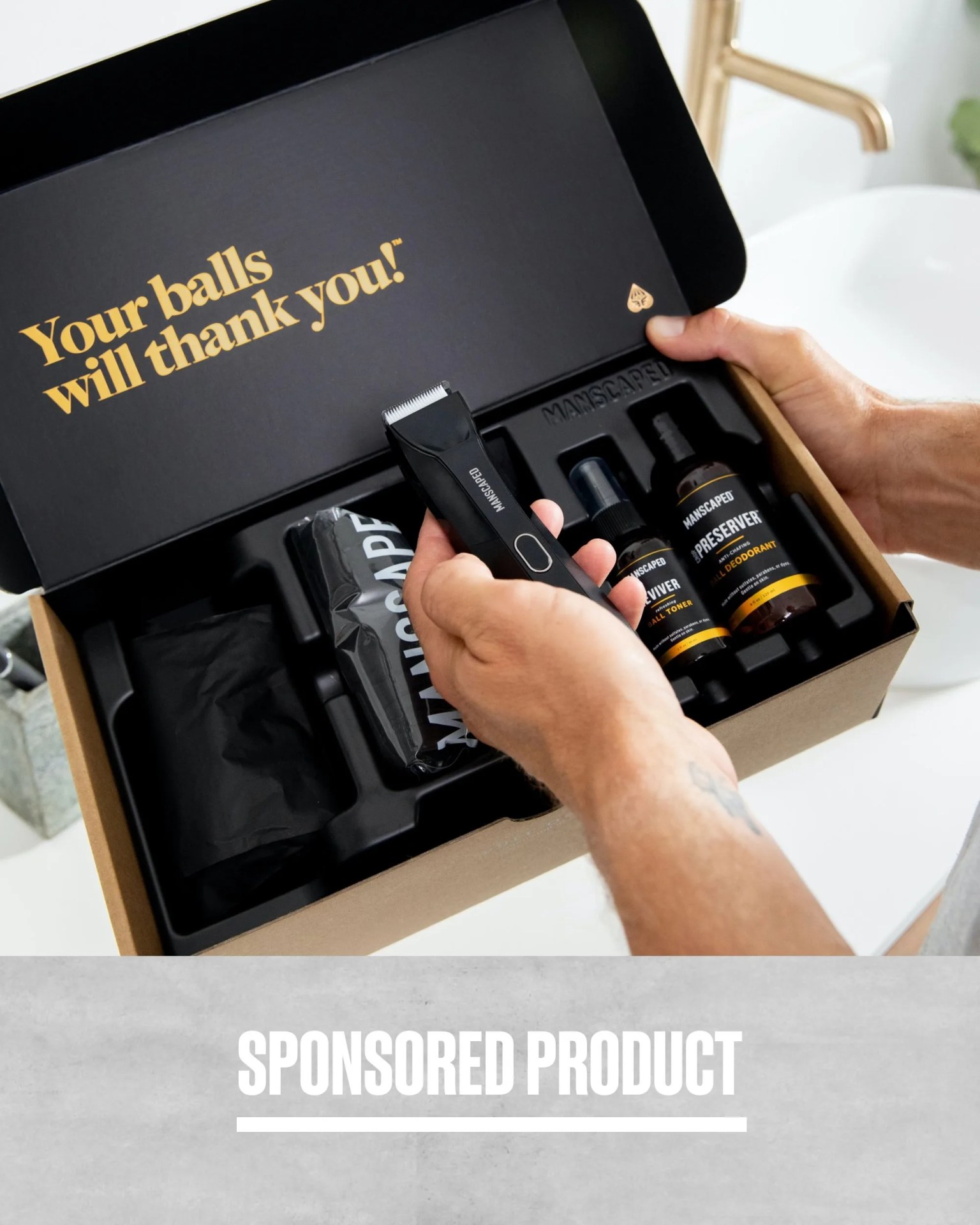sponsored product your balls will thank you man opening manscaped bundle from a box holding a shaver