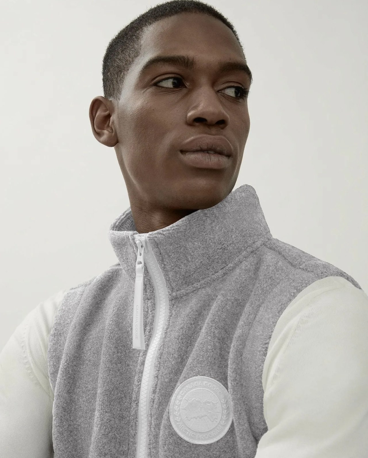 canada goose's man wearing humanature fleece vest made from kind fleece