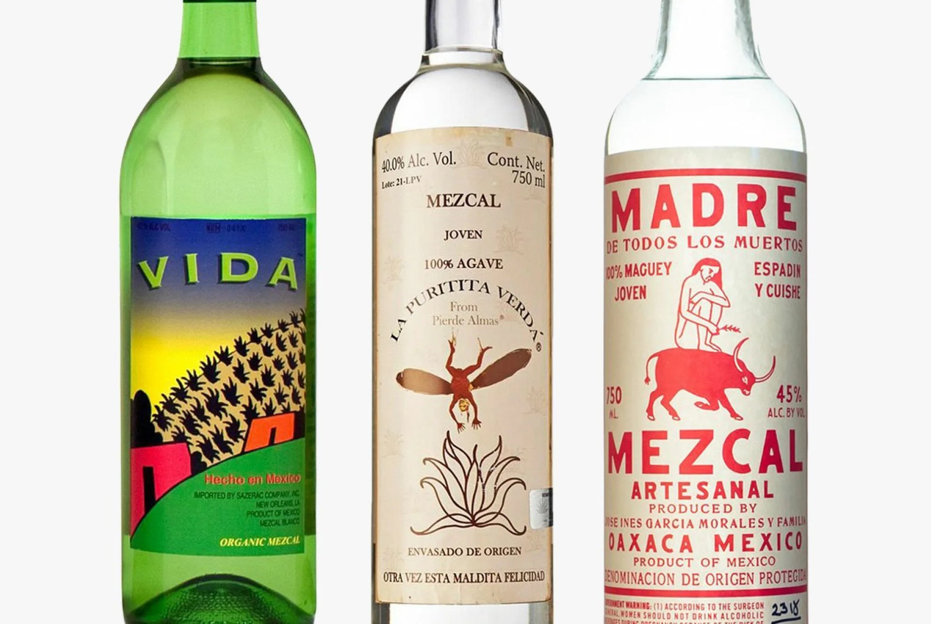 three bottles of mezcal