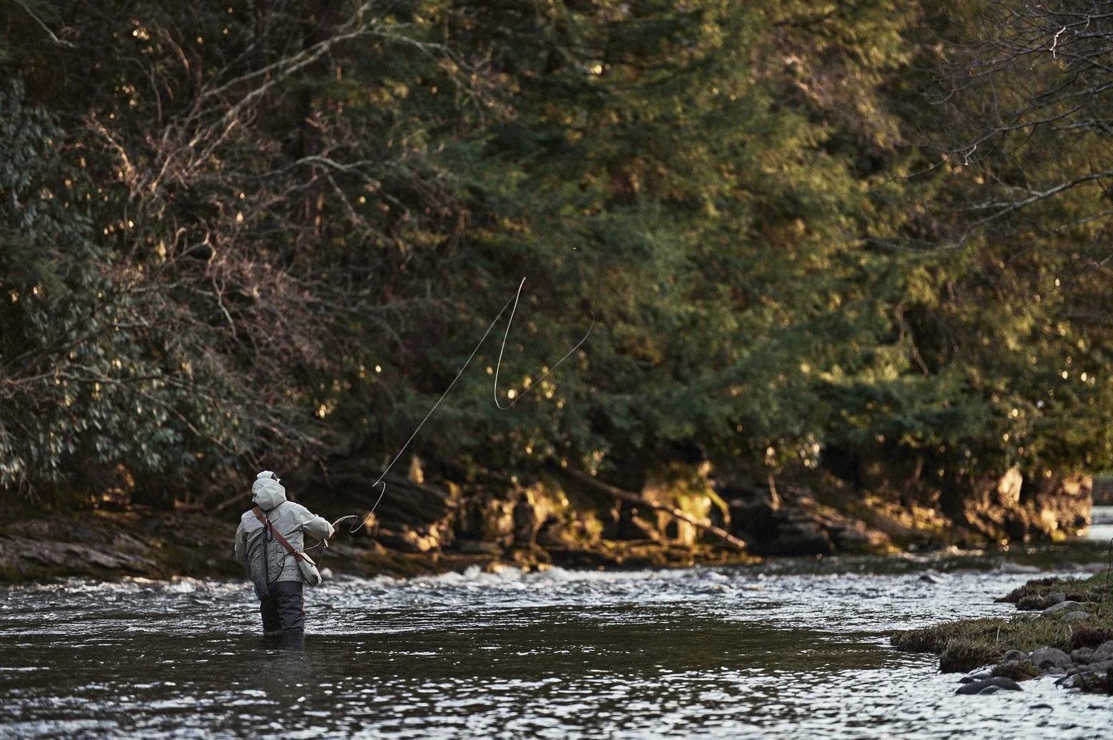 aime x woolrich fisherman in a river