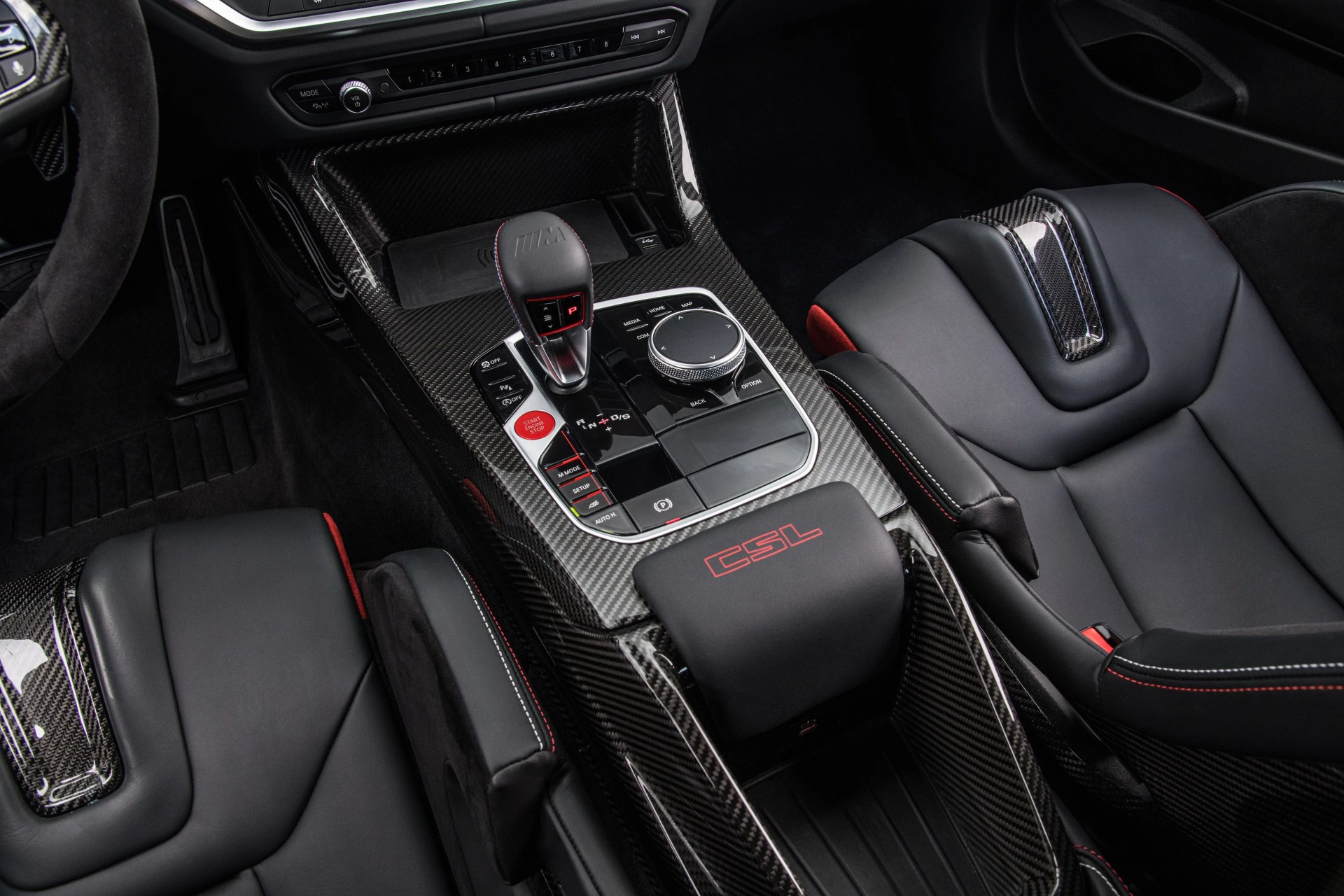 bmw m4 csl interior shot of the shift knob and carbon fiber sport seats
