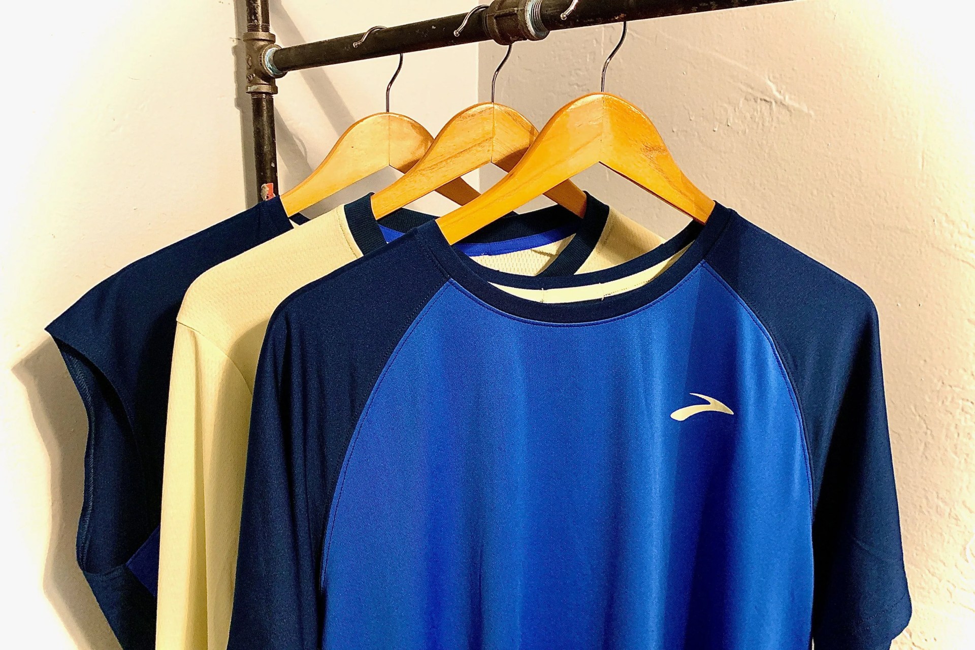 brooks running clothing hanging