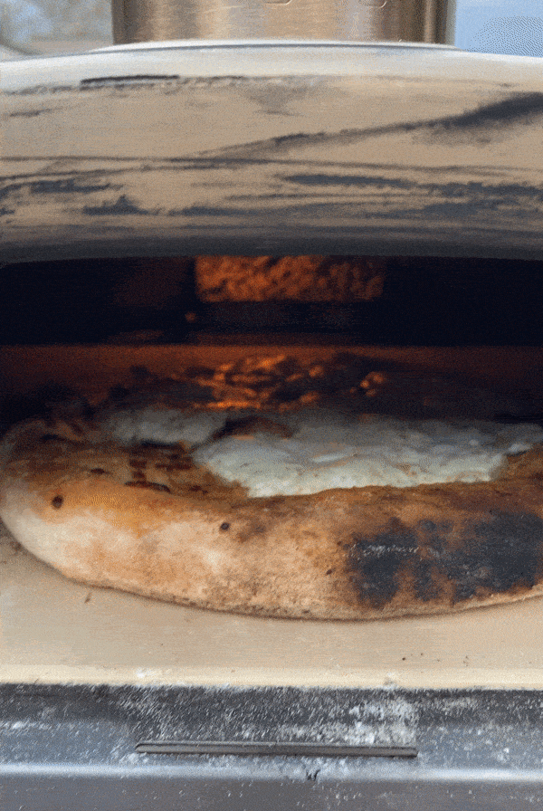 pizza baking in ooni fyra oven