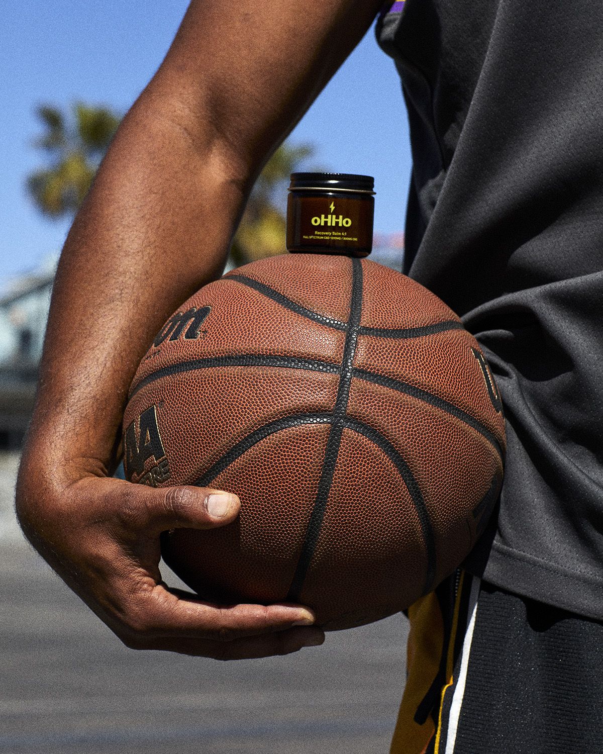 ohho balm balanced atop basketball