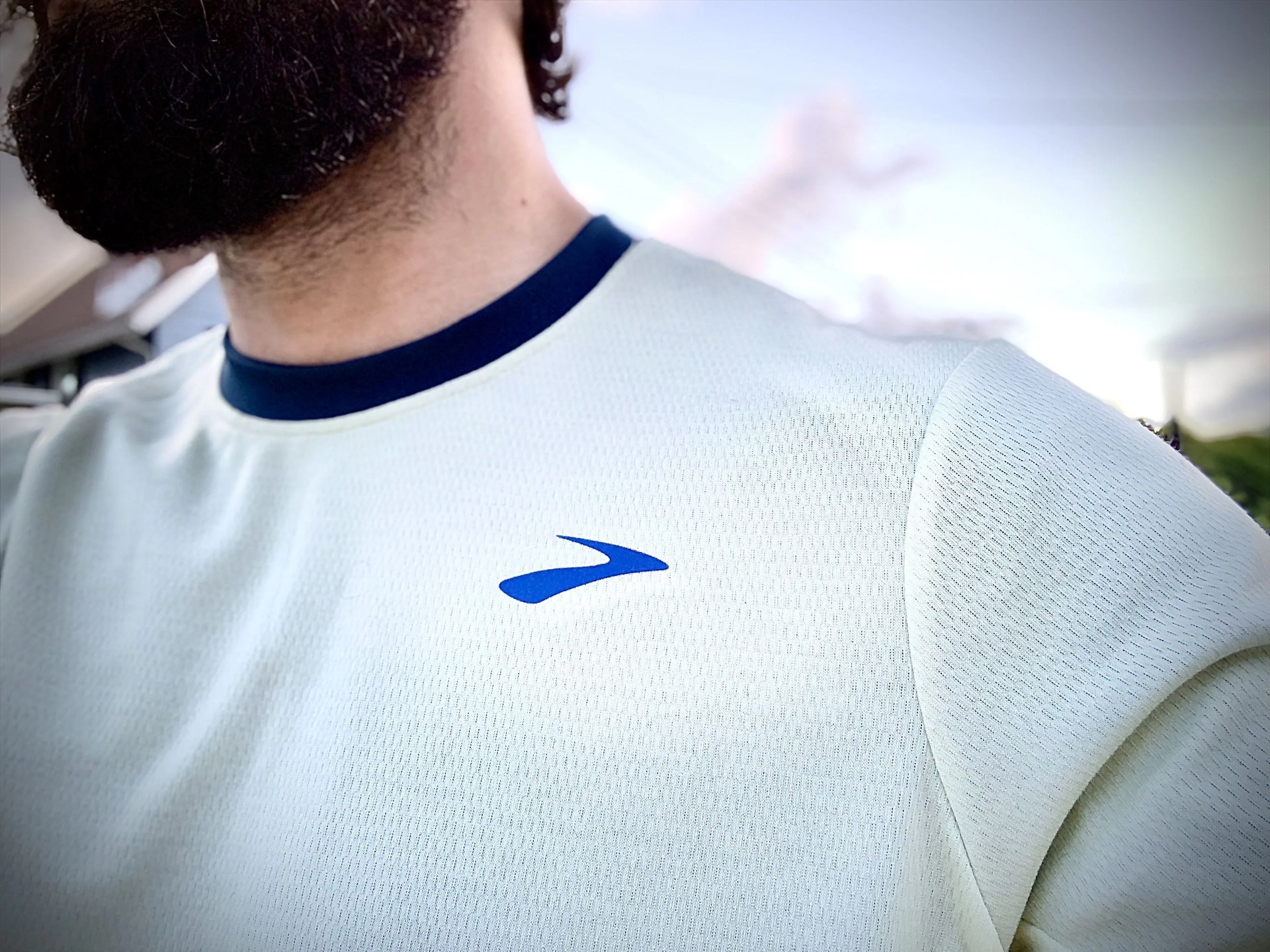 man wearing brooks run within long sleeve