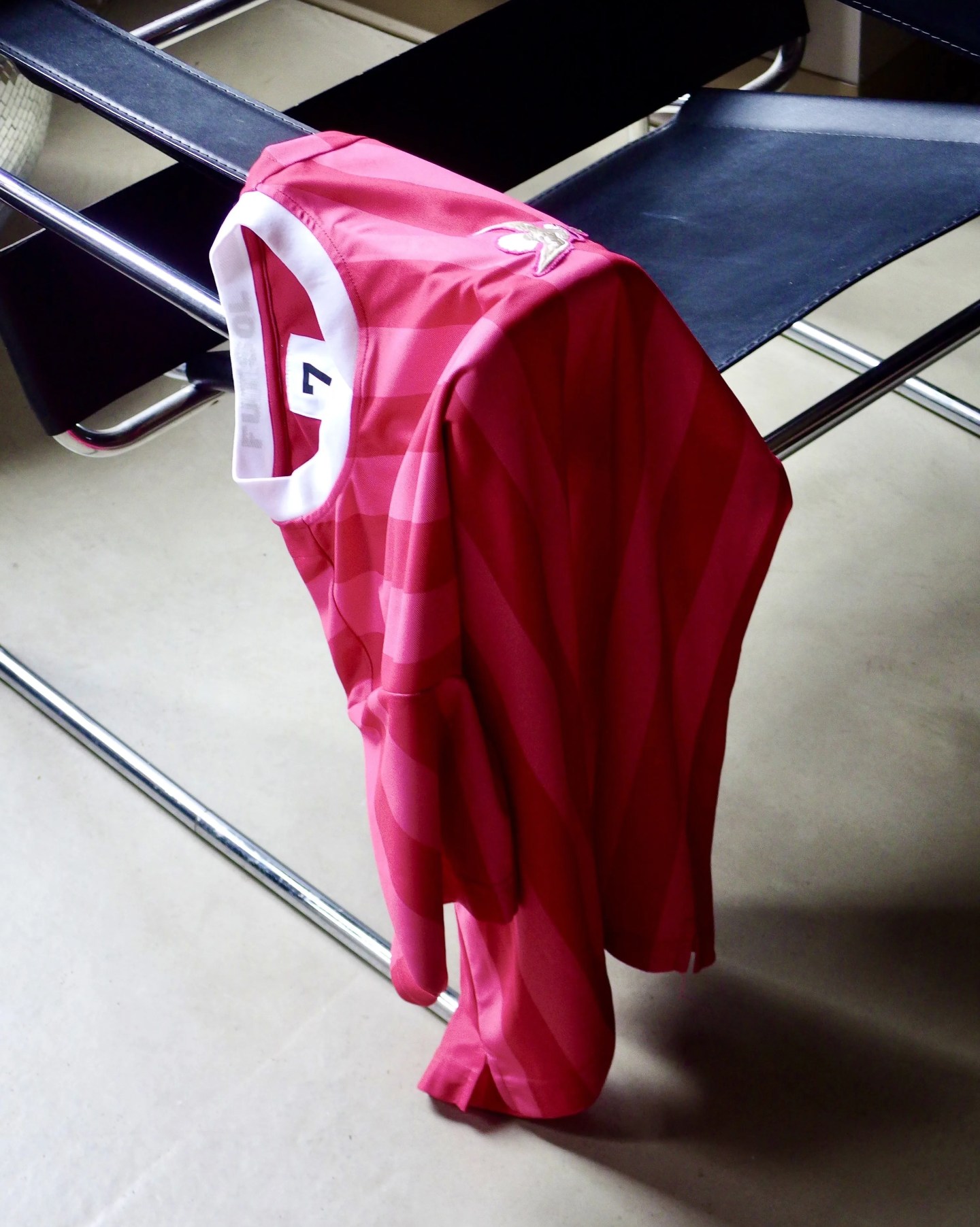 fustol jersey draped on a chair
