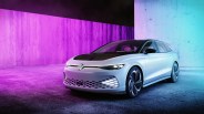 volkswagen id space vizzion concept parked in a concrete room with purple back lighting