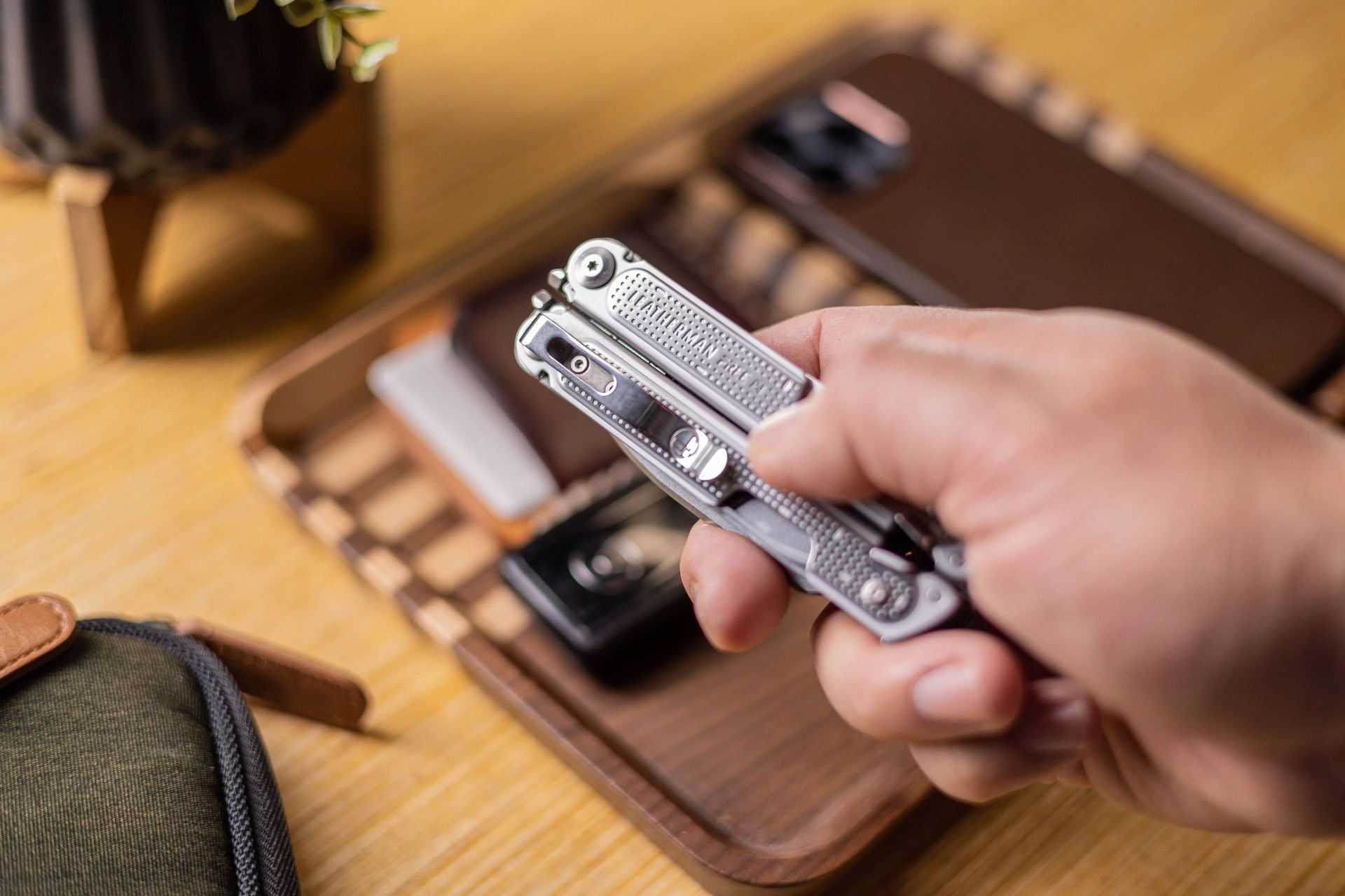 hand holding leatherman tool