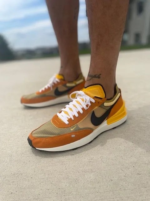 model wearing nike waffle one sneaker