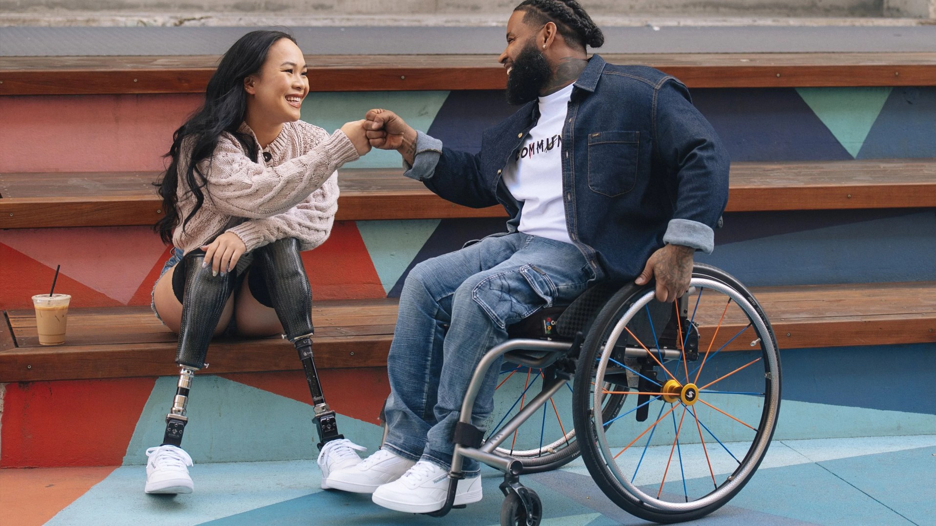 two people wearing reebok fit to fit footwear collection