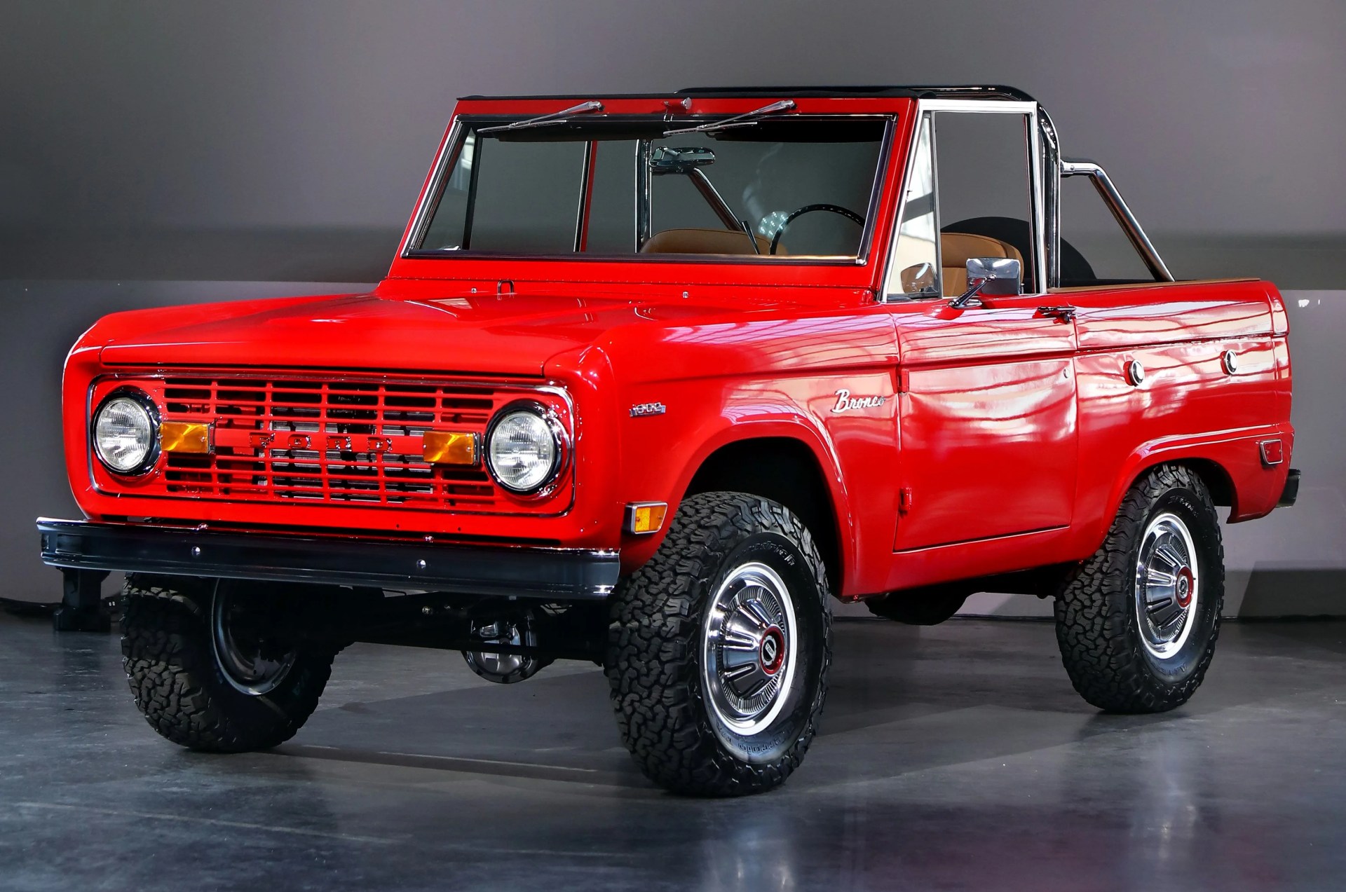 actress sydney sweeney and her restored red 1969 ford bronco