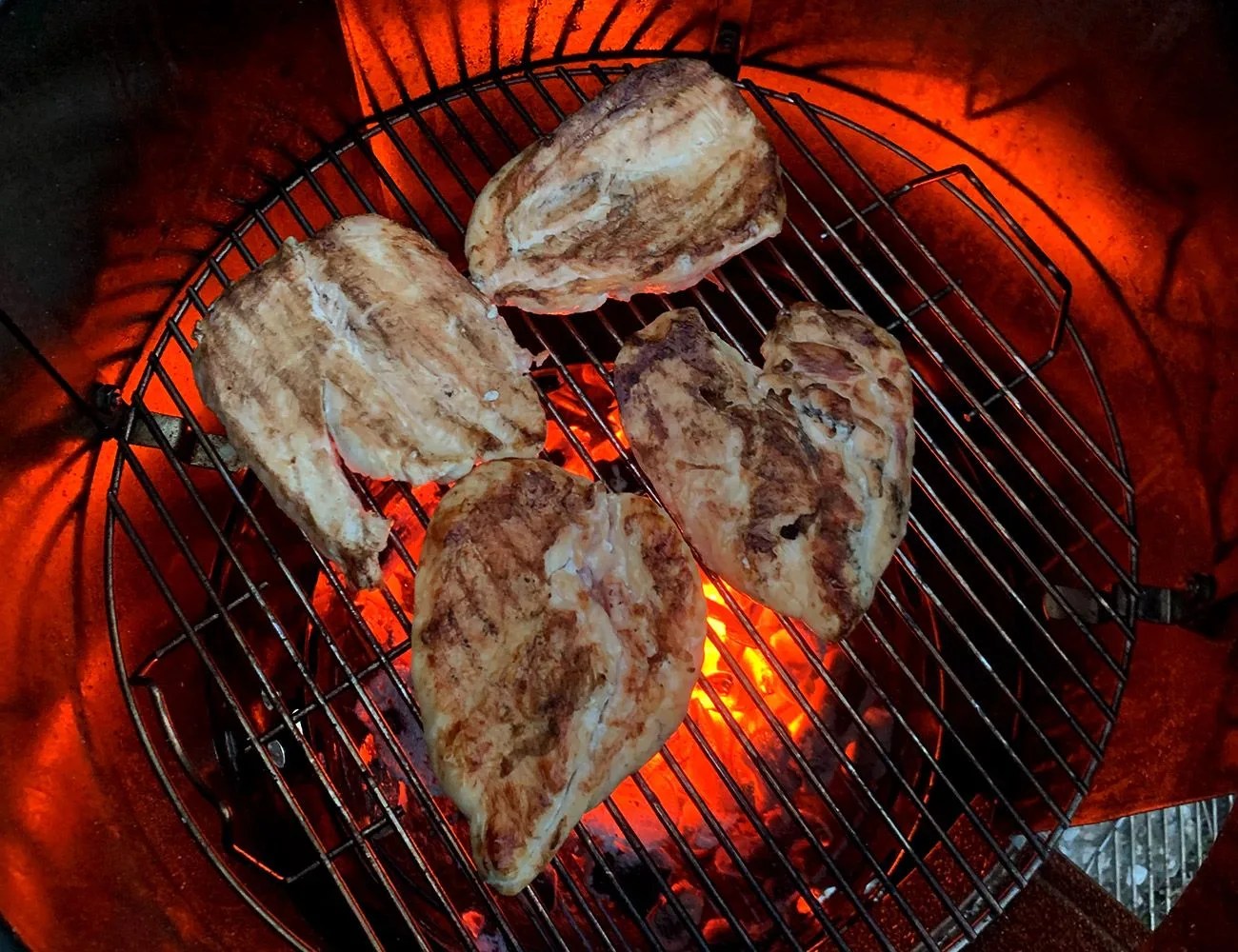 chicken breasts grilling