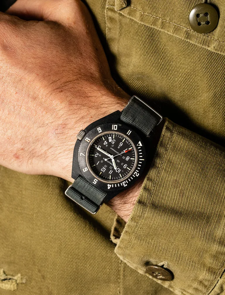 man wearing watch on wrist