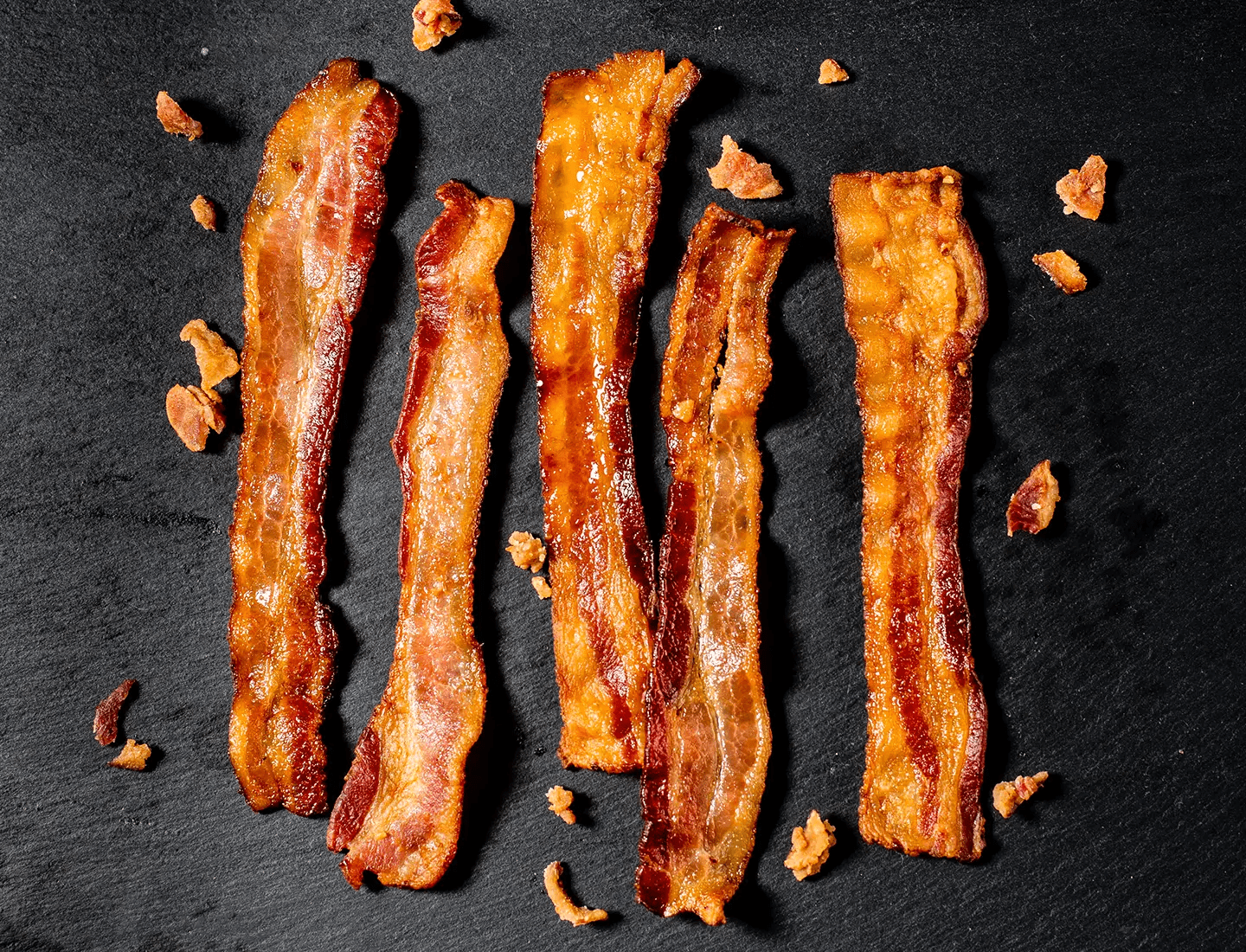 butcher box bacon on a black slate