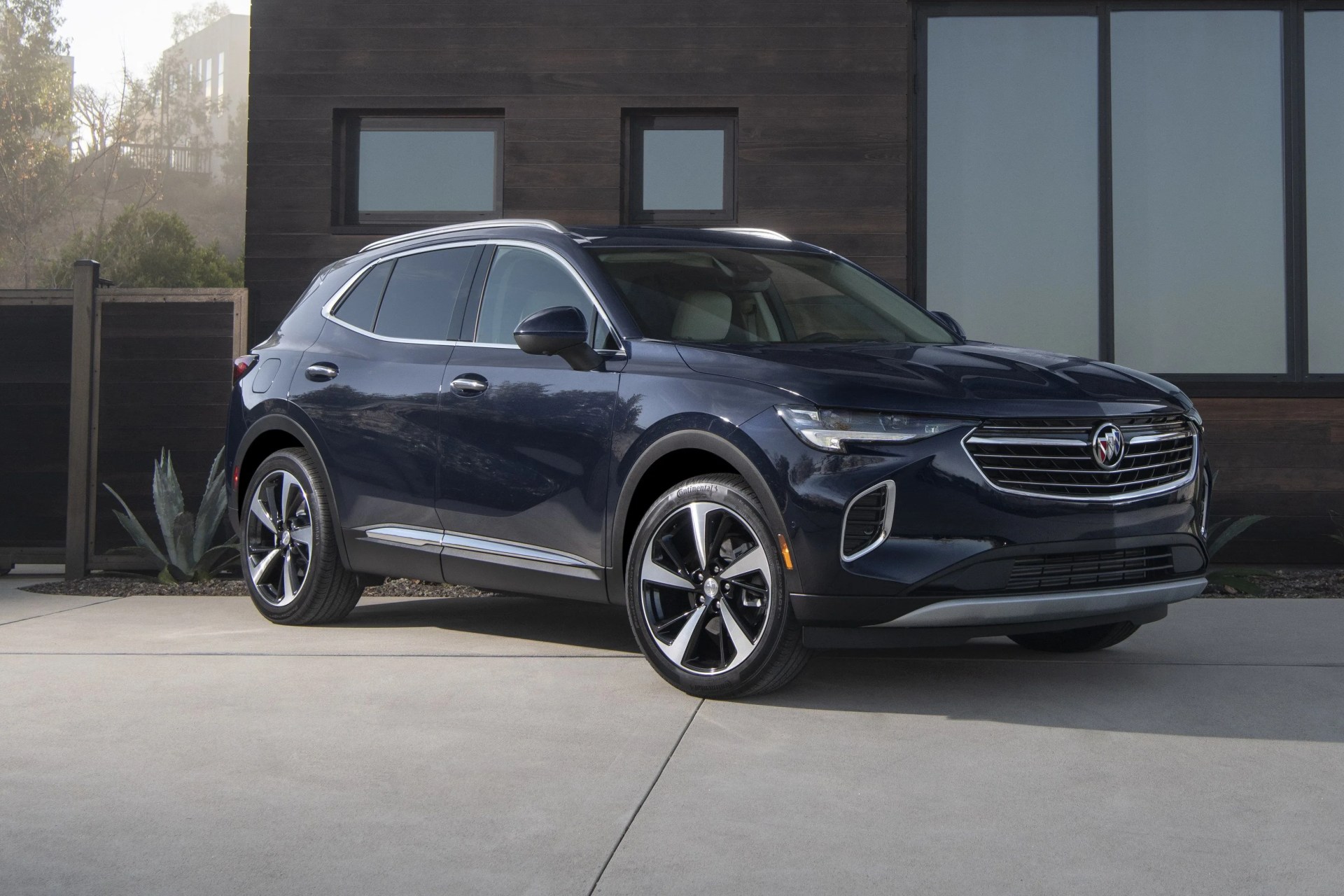the 2021 envision has a lower, wider stance with more athletic proportions to appeal to buyers who like the look of a car but want the functionality of an suv
