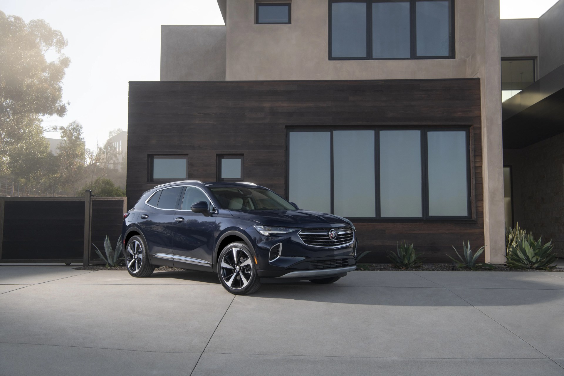 the 2021 envision has a lower, wider stance with more athletic proportions to appeal to buyers who like the look of a car but want the functionality of an suv