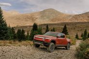 rivian r1t pickup truck off roading