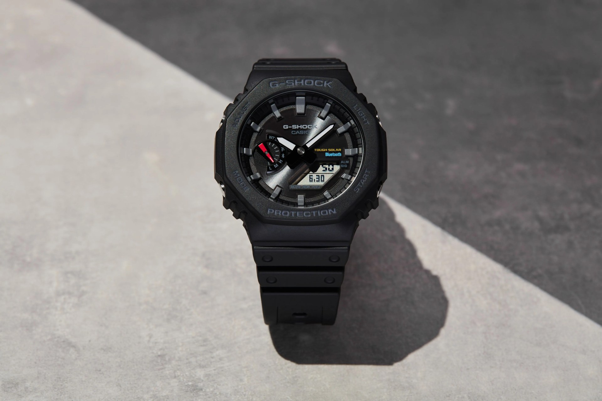 studio shot of black gshock solar powered watch
