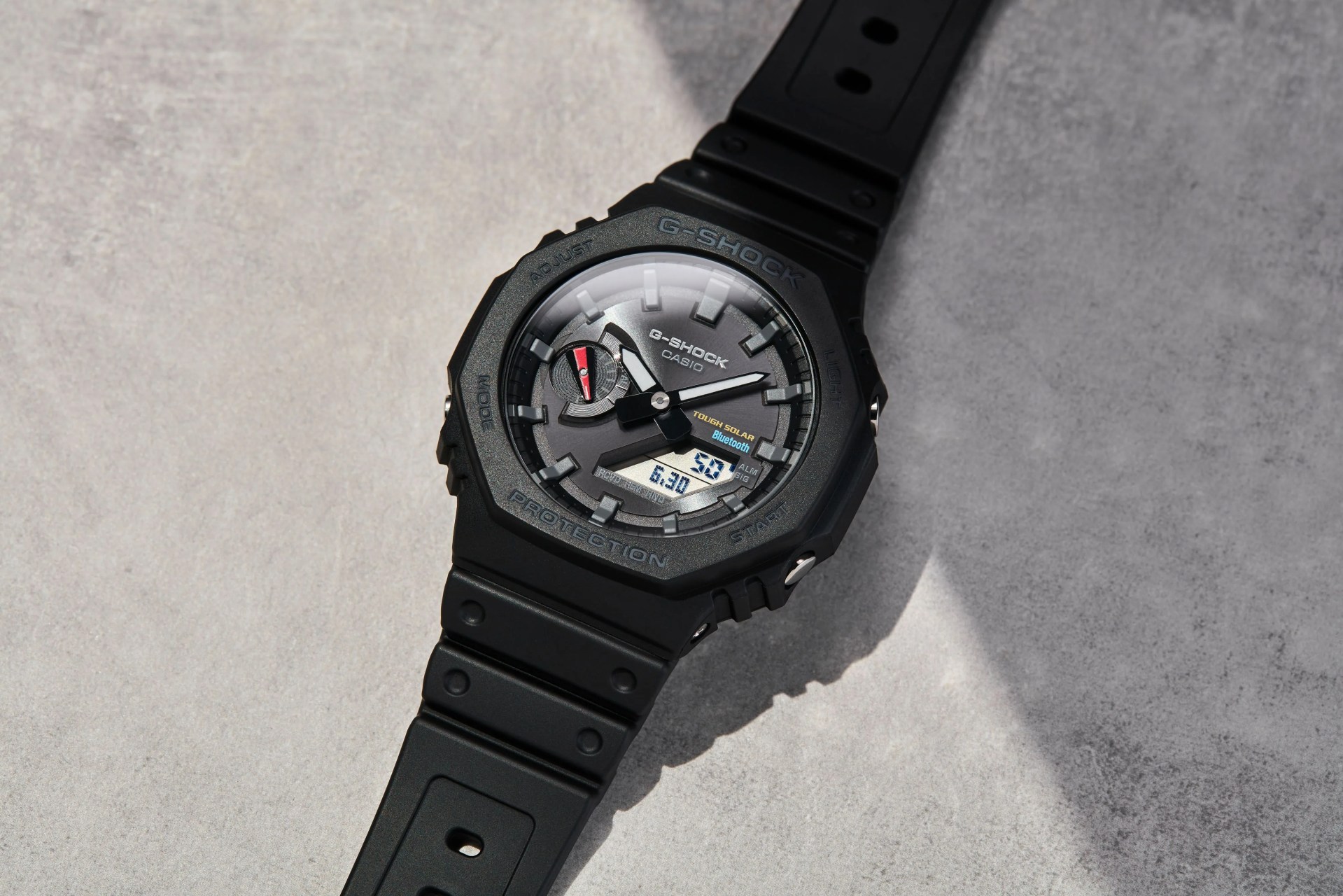 studio shot of black gshock solar powered watch