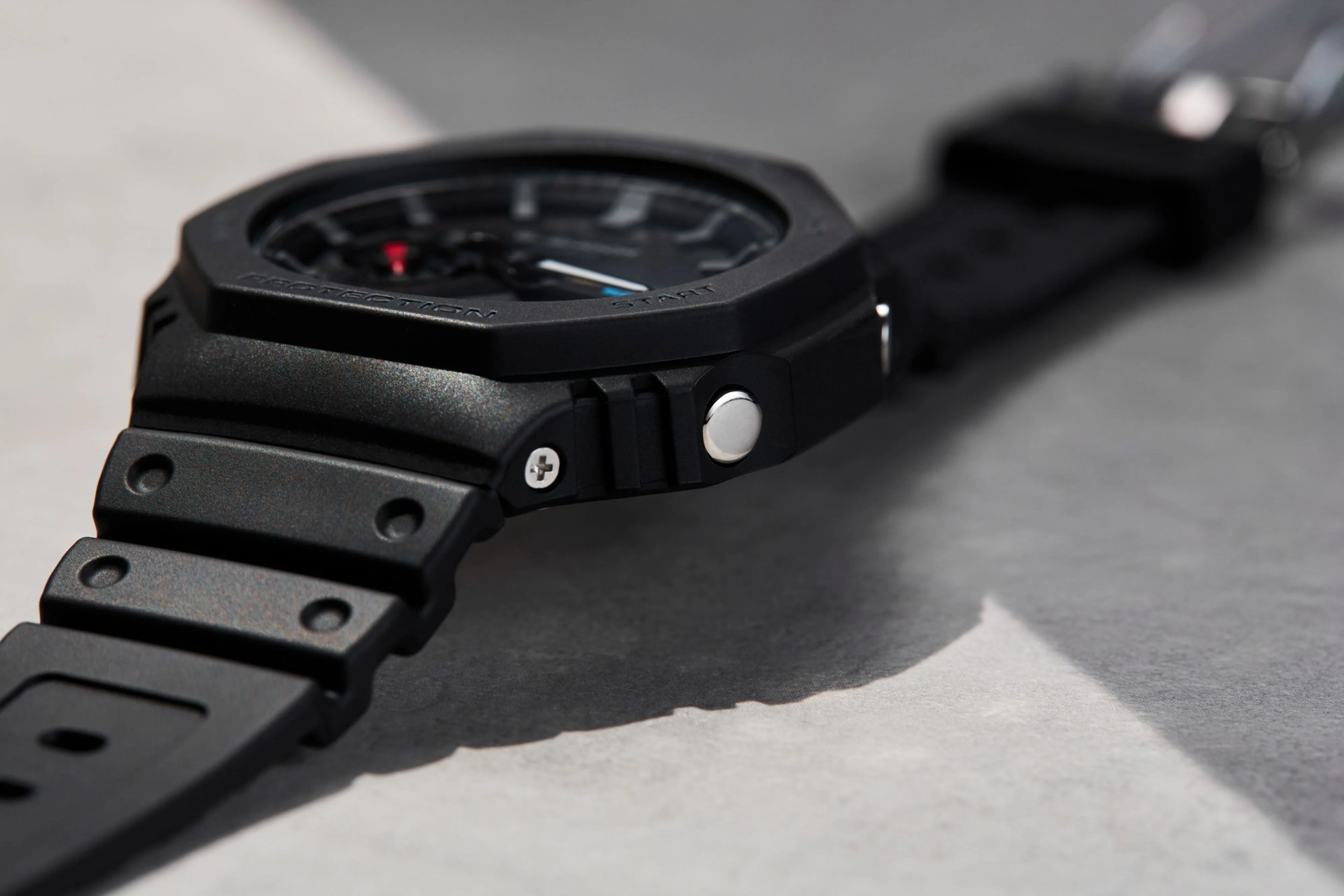 studio shot of black gshock solar powered watch
