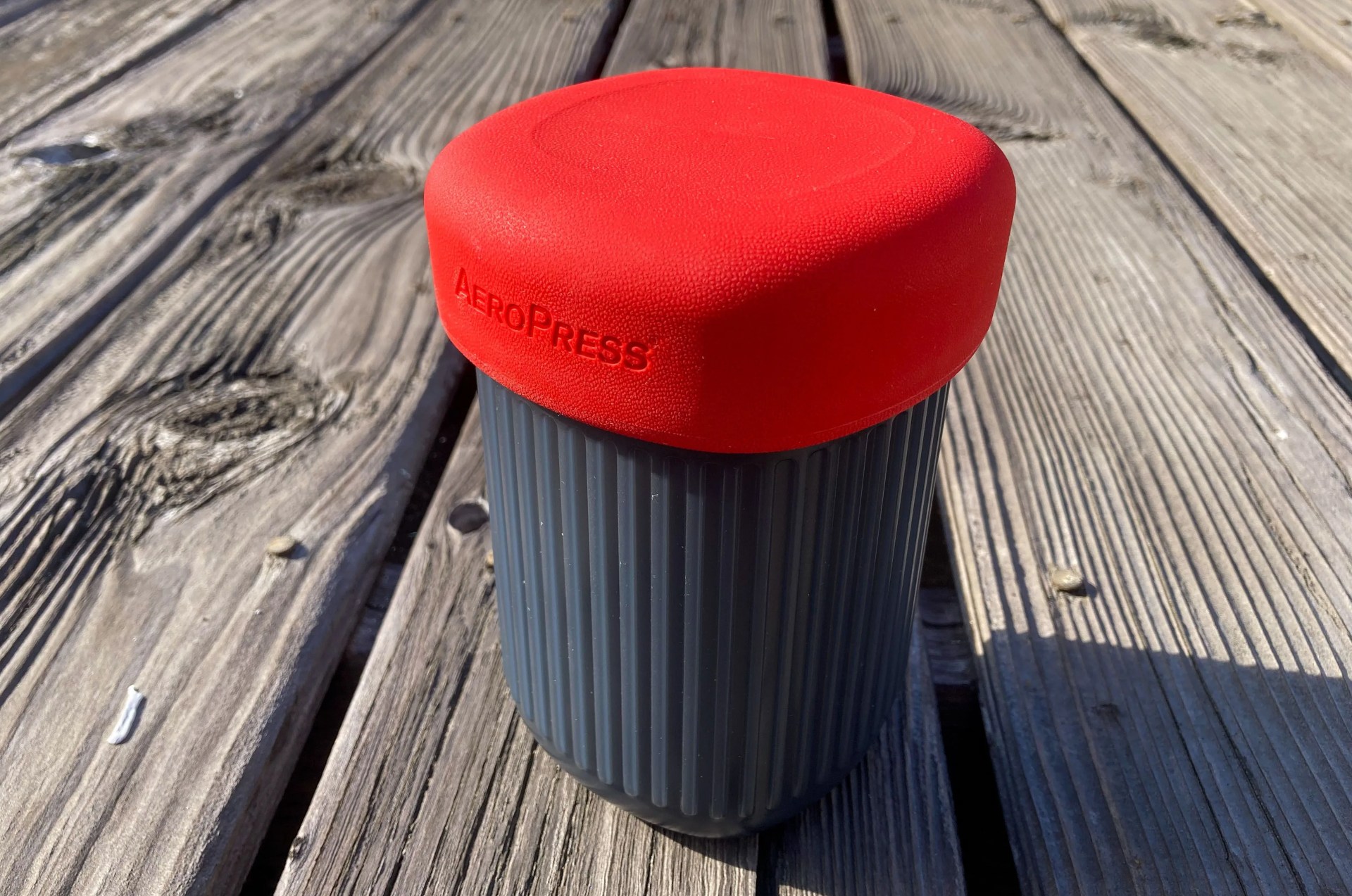 aeropress go coffee maker on a table