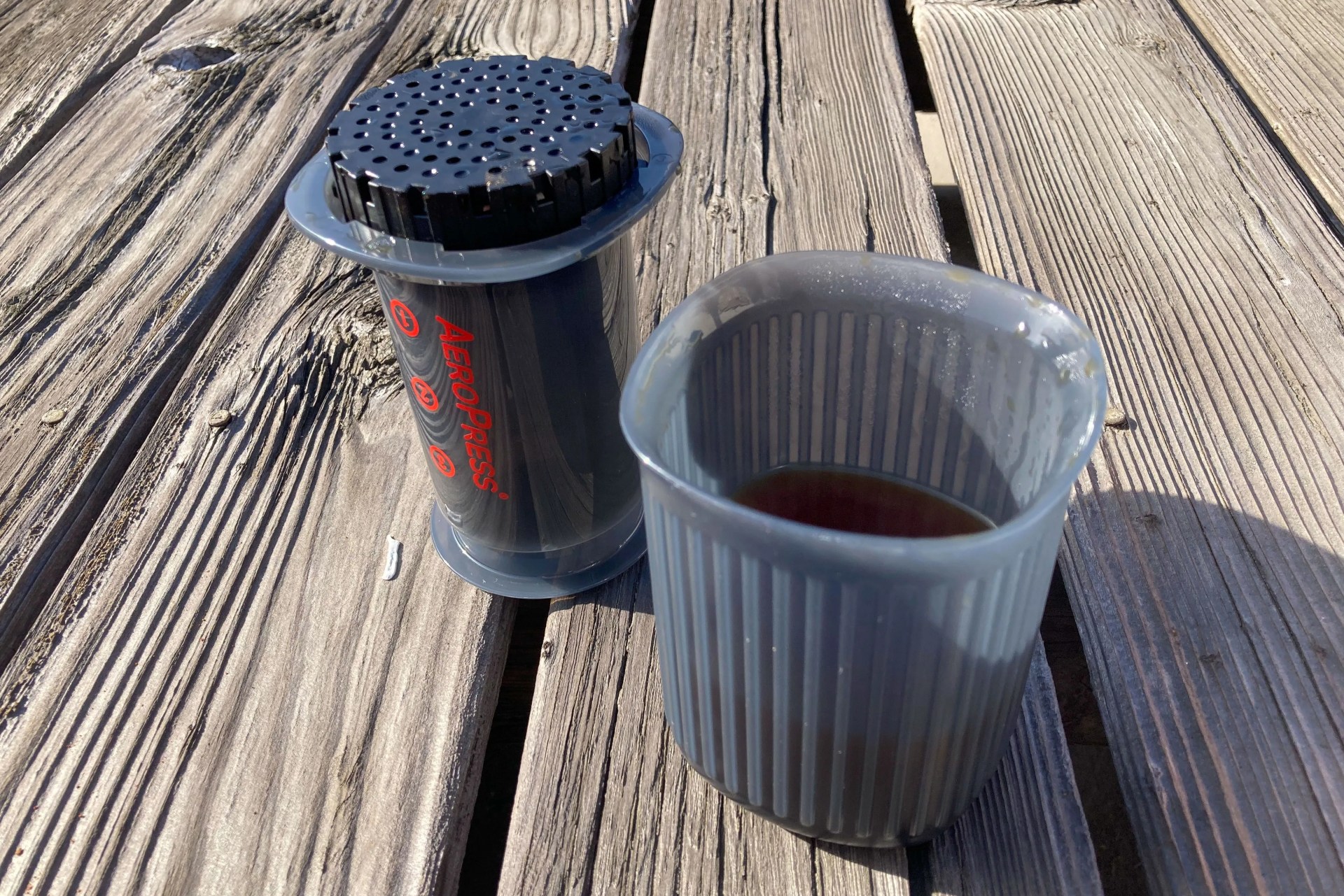 aeropress go coffee maker on a table