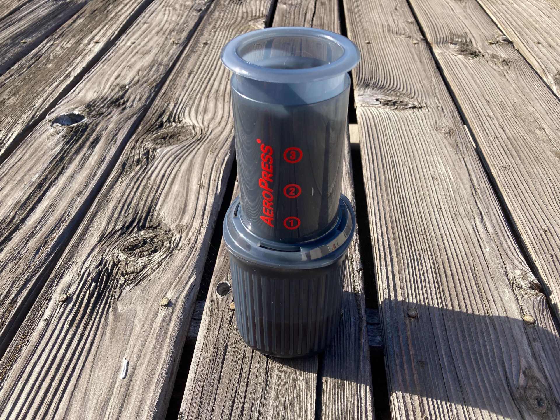aeropress go coffee maker on a table