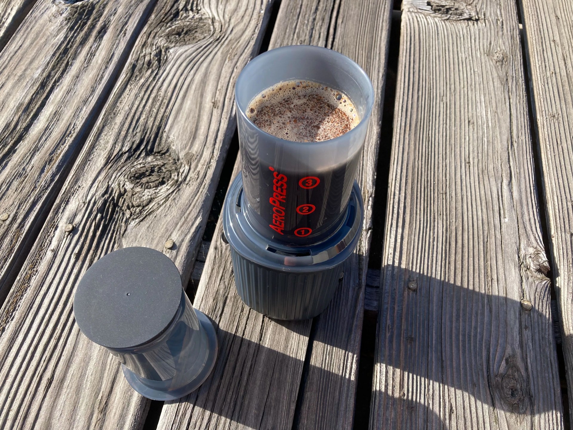 aeropress go coffee maker on a table