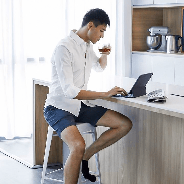 man sitting with laptop