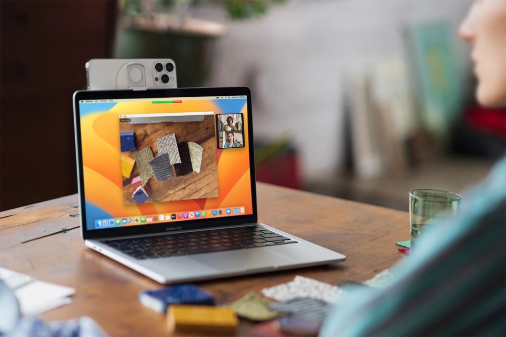 macbook with iphone attached