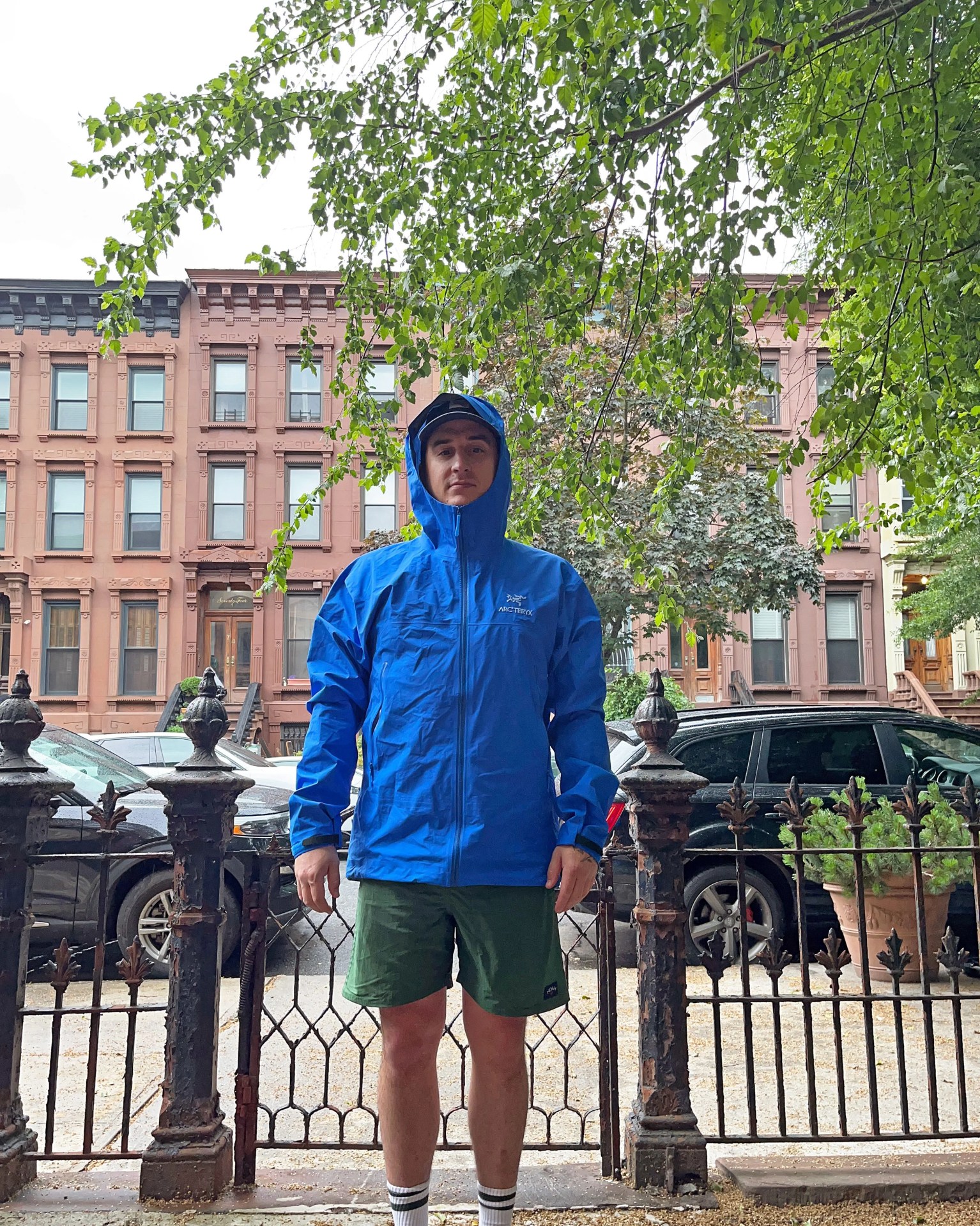 man wearing a blue arcteryx beta jacket