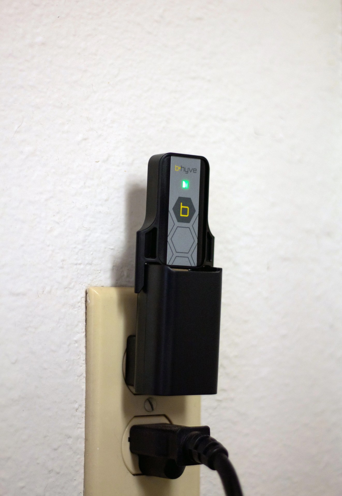 b hyve smart watering hose timer wifi hub plugged into wall