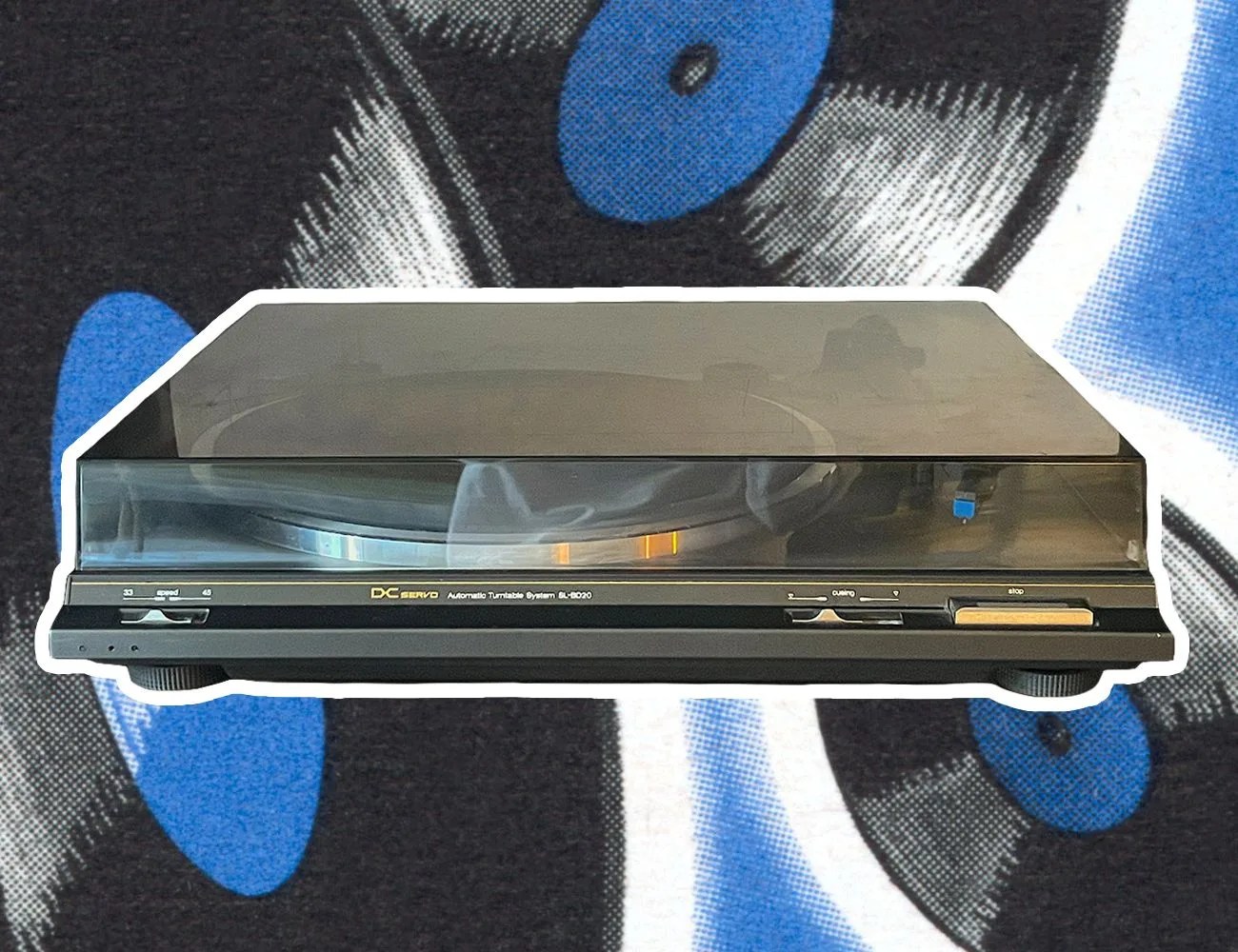 a balck record player overlayed on a photo of blue records