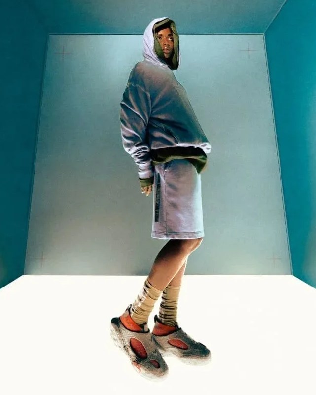 man wearing acw x converse sponge crater cx sneaker looking off into the distance