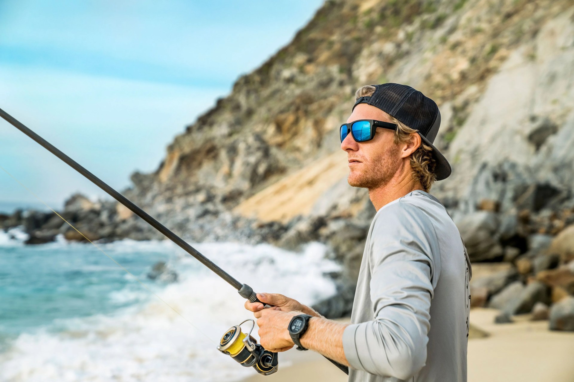 man wearing costa lido sunglasses while fishing