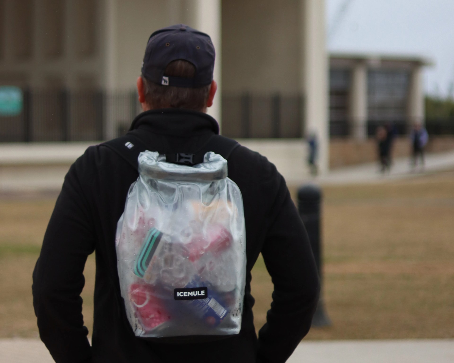 man wearing icemule jaunt cooler as a backpack
